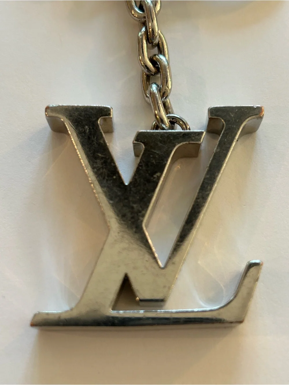 Louis Vuitton Silver Metal LV Logo Keyring Charm